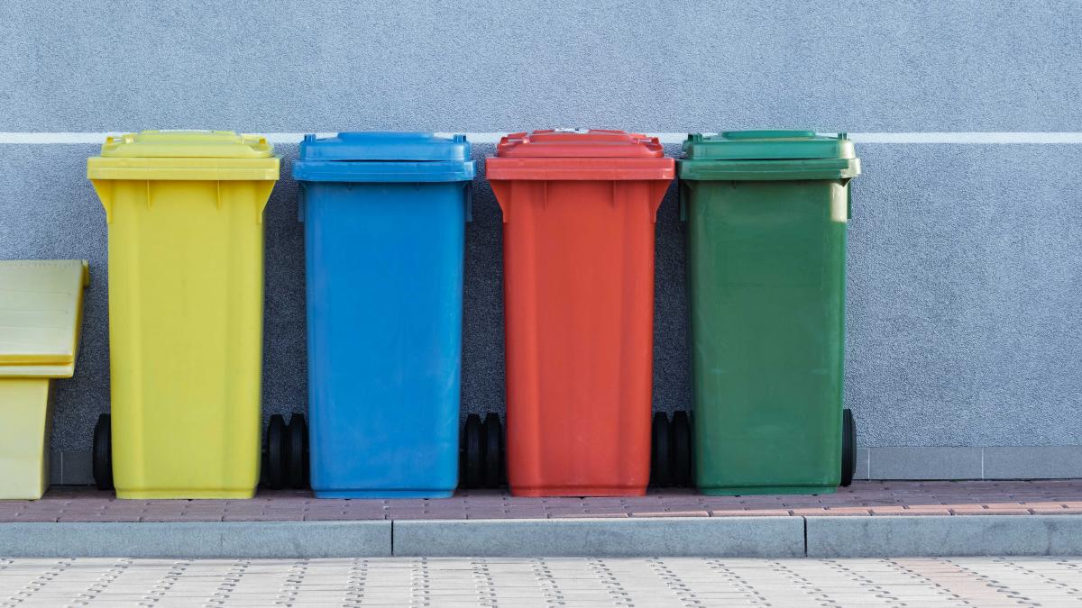Colorful trash cans lined up