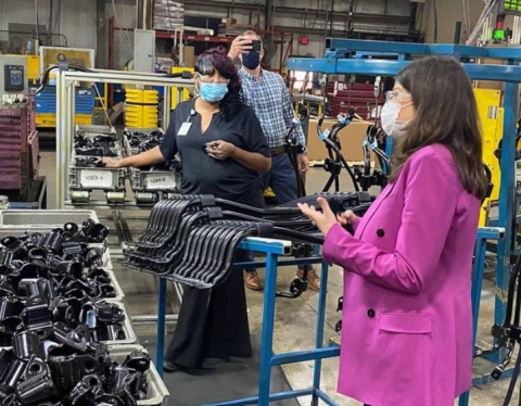 Congresswoman Stevens speaking with a worker at Airboss America
