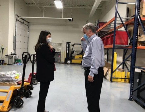 Congresswoman Stevens talking with someone at AME companies