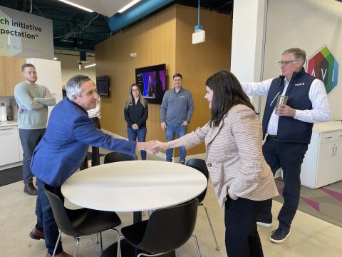 Rep. Stevens shakes hand with one of the experts at Forte
