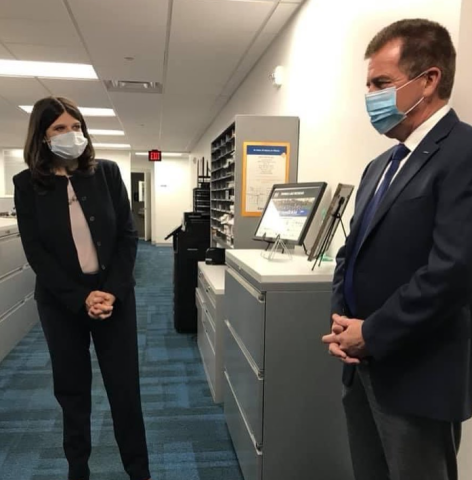 Congresswoman Stevens talking with someone at MAHLE