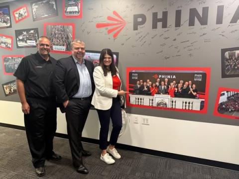 Rep. Stevens poses with experts at PHINIA
