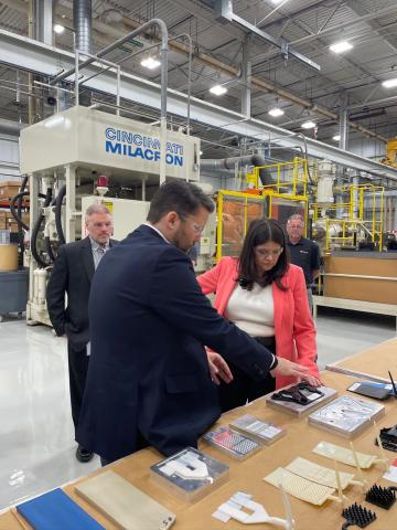 An expert shows Rep. Stevens one of their products
