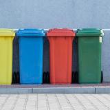 Colorful trash cans lined up